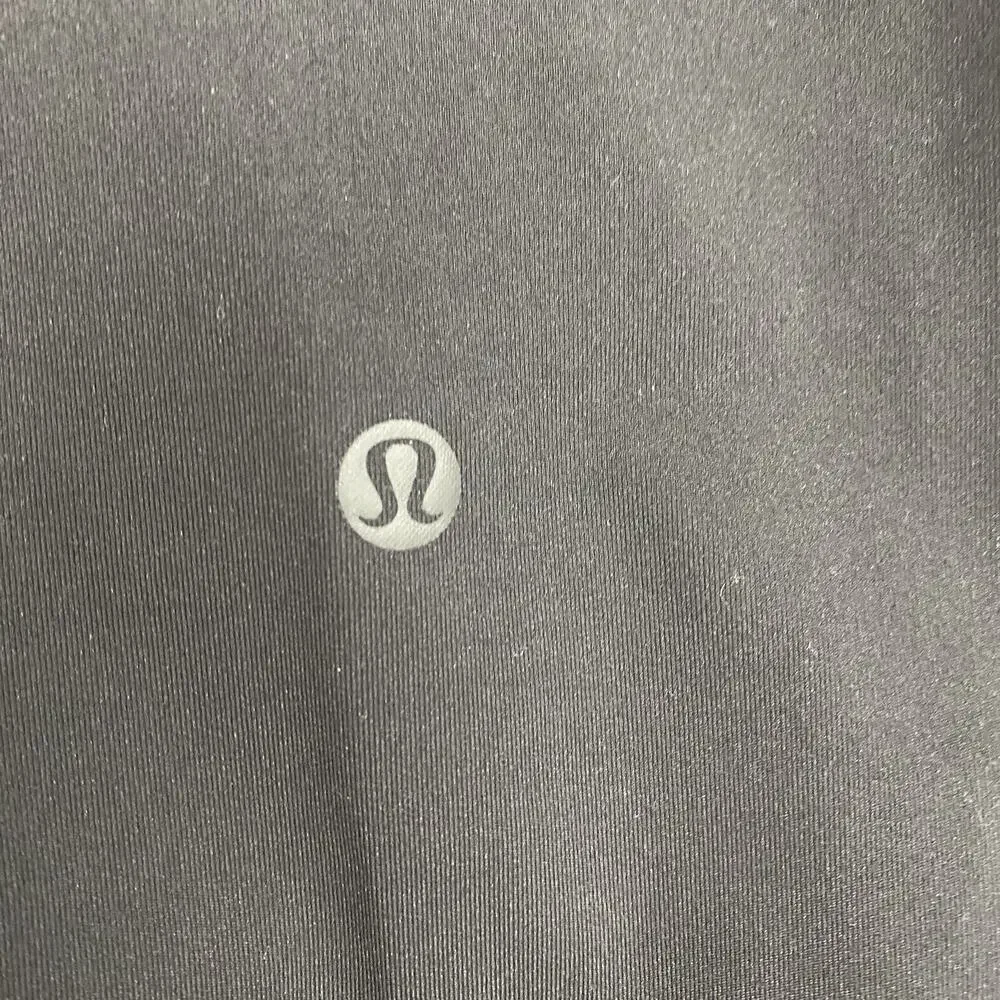 Lululemon On The Fly Pants Women 4 Black Luxtreme 28” Stretch Travel Tapered